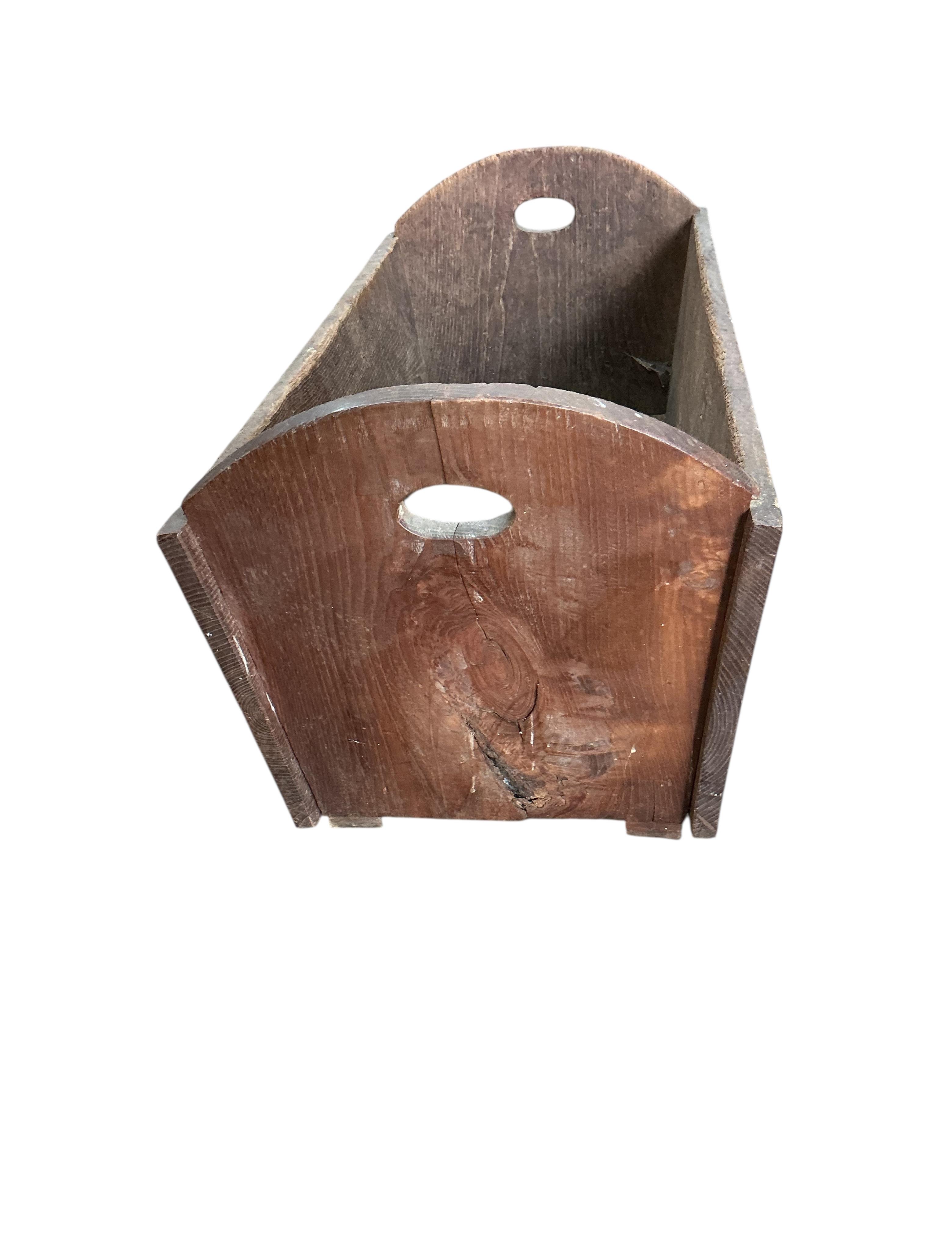 An oak log bin, width 95cm, depth 47cm, height 47cm